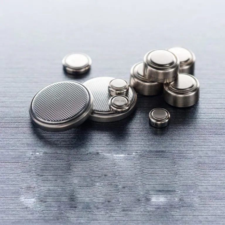TimeRepair specialist carefully replacing a watch battery
