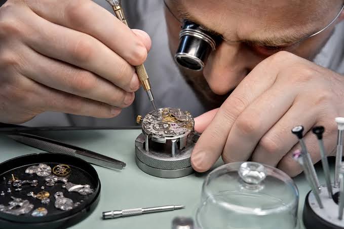 TimeRepair team organizing a watch repair plan and timepiece service details