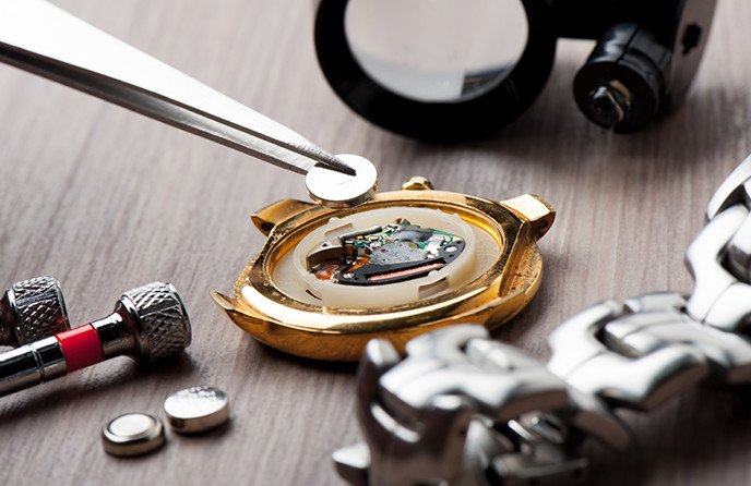 TimeRepair specialist performing precision watch maintenance