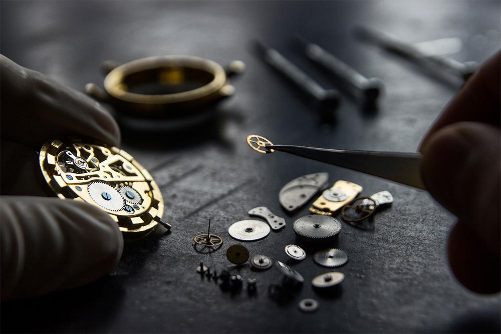 TimeRepair specialist preparing a watch for detailed servicing